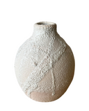 Three porcelain crater vases in beige, white, and black colors, each with a textured, frothy glaze.