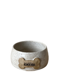 A set of three custom dog bowls in sizes, each with a bone-shaped name plate, in matte black color.