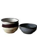 A set of ceramic pasta bowls.