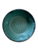 Blue ceramic bowl on a white background