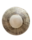 Decorative plate with grid pattern on a white background