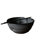 A gray noodle bowl on a white background.