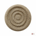 Round stone with concentric spiral pattern on a white background