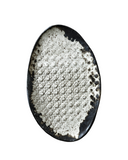 Decorative ceramic plate with textured surface on a white background