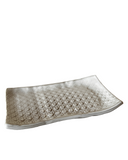 Decorative rectangular plate with textured surface on a white background