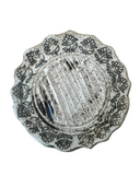 Decorative ceramic plate with floral patterns on a white background