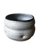 A collection of handcrafted brown stoneware flower pots with a matte glaze and bronze accents, displayed against a white background.
