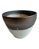 Ceramic planter with brown and white gradient on a white background