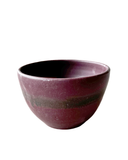 Purple ceramic bowl on a white background