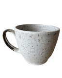 White mug on white background