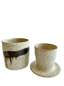 A ceramic butter crock. 