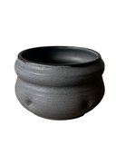 A collection of handcrafted brown stoneware flower pots with a matte glaze and bronze accents, displayed against a white background.