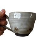 Gray and black mug on white background