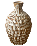 Decorative vase with textured brown and white pattern on a white background