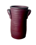 Red crock on white background
