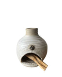 Palo santo chimea on white background