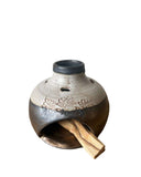 gold beige palo santo burner on white background 