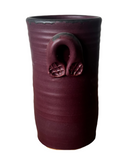 Red crock on white background