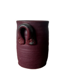 Red crock on white background