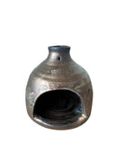 Gold incense palo santo burner on white background