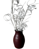 Decorative vase with twisted branches on a white background