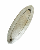 Fishing lure with speckled pattern on a white background