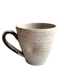 White mug on white background
