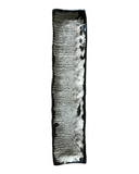 Tall, rectangular black and white sculpture on a white background