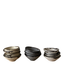 A set of mini bowls on a white background