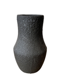 Three porcelain vases in white, gray, and black colors with a textured, frothy glaze, displayed side by side.