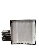 Stack of square plates on white background