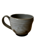 Gray ceramic mug on a white background