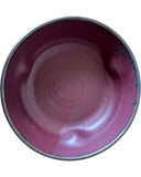 Burgundy Red ceramic bowl on a white background