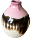 Vase with pink top and brown and beige gradient base on a white background
