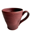 Red coffee mug on white background