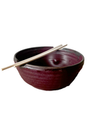 red noodle bowl on a white background