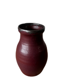 Brown ceramic vase on a white background