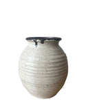 beige and bronze vase on a white background 