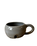 Gray and black mug on white background