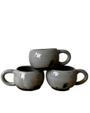 Gray and black mug on white background