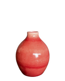 Red ceramic vase on a white background