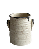 beige crock on white background