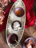 Dishes with food on a rustic wooden table