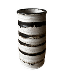 Cylindrical ceramic vase with black stripes on a white background