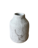 A set of three gray porcelain vases with a textured surface, in varying shapes and sizes, with the largest on the left and two smaller ones on the right.