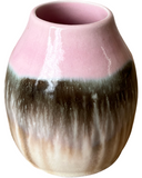 Pink and brown ceramic vase on a white background