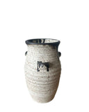Beige and bronze vase with handles on a white background 
