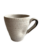 White mug on white background