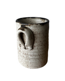 White crock on white background
