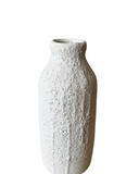 A set of three white porcelain vases with a textured, frothy glaze, in varying shapes and sizes, displayed against a white background.